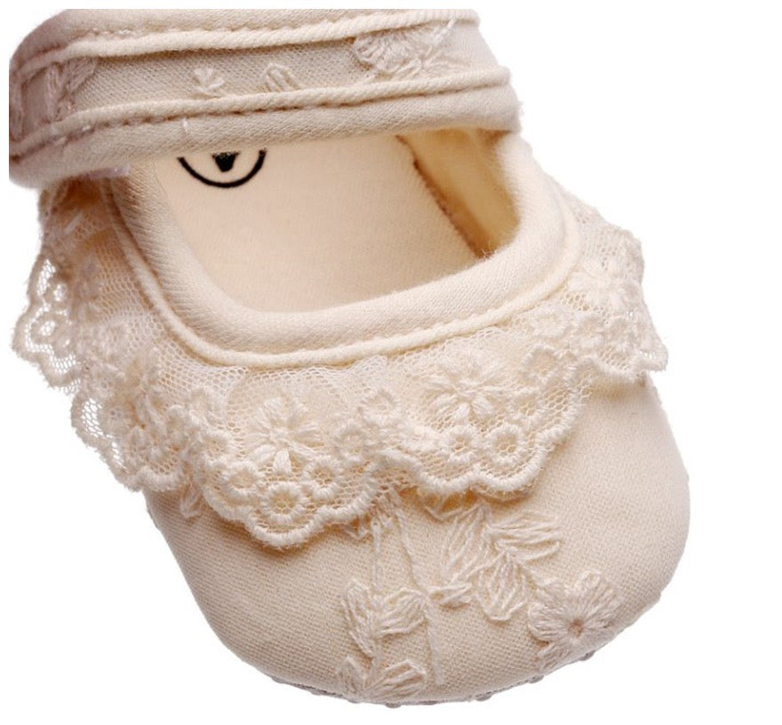 Lace baby shoes