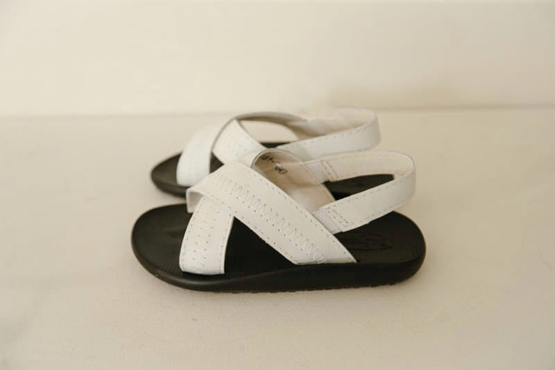 Stitch cross sandals