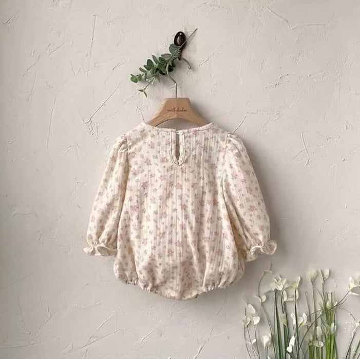 Smocked floral bodysuit